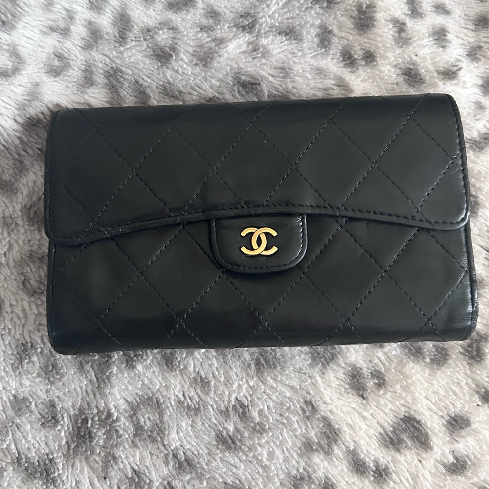 CHANEL Black Quilted Wallet with Gold Logo